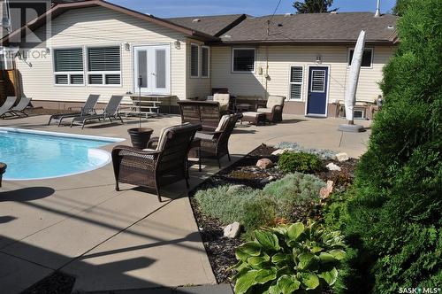 310 Willow Street E, Saskatoon, SK - Outdoor With In Ground Pool With Deck Patio Veranda