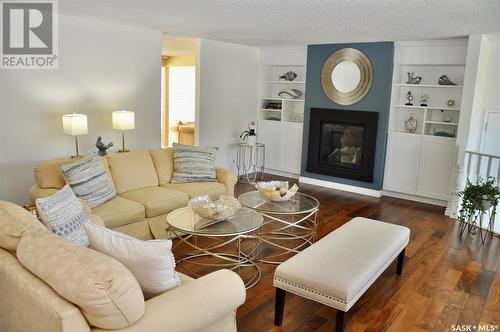 310 Willow Street E, Saskatoon, SK - Indoor Photo Showing Living Room With Fireplace