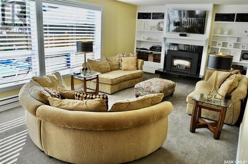 310 Willow Street E, Saskatoon, SK - Indoor Photo Showing Living Room With Fireplace