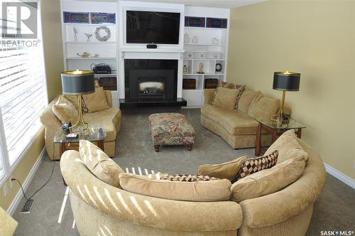 310 Willow Street E, Saskatoon, SK - Indoor Photo Showing Living Room With Fireplace