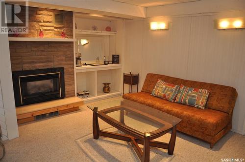 310 Willow Street E, Saskatoon, SK - Indoor Photo Showing Living Room With Fireplace