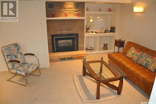 310 Willow Street E, Saskatoon, SK - Indoor Photo Showing Living Room With Fireplace