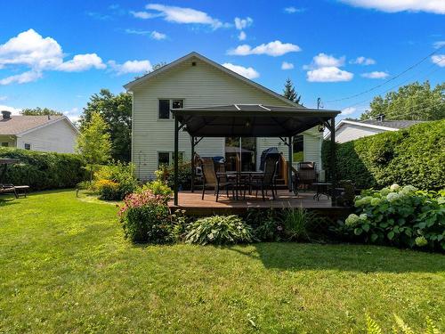 Back facade - 42 Rue De L'Arche, Notre-Dame-De-L'Île-Perrot, QC - Outdoor With Deck Patio Veranda