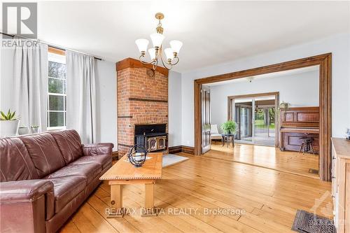 140 High Street, Prescott And Russell, ON - Indoor Photo Showing Living Room With Fireplace