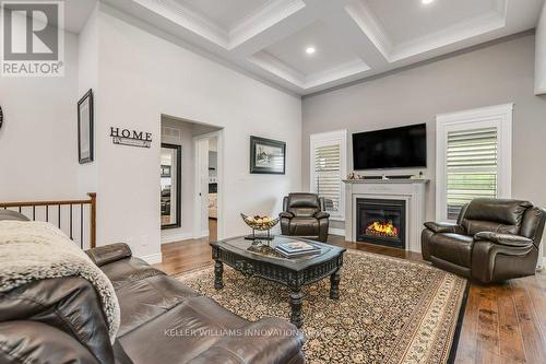 545 Krotz Street E, North Perth, ON - Indoor Photo Showing Living Room With Fireplace