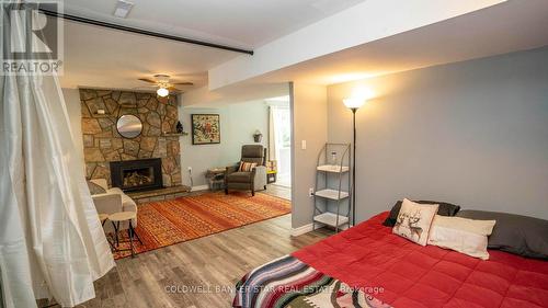 270 William Street E, North Middlesex, ON - Indoor Photo Showing Bedroom With Fireplace