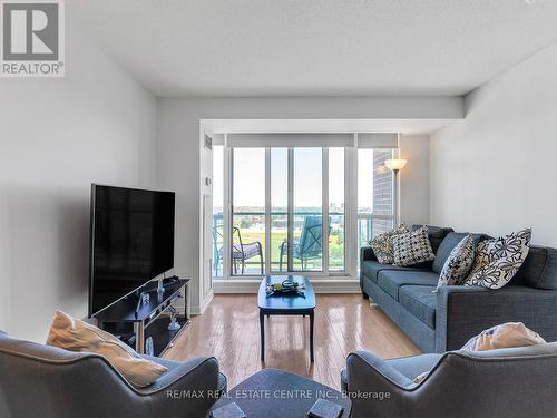 907 - 4879 Kimbermount Avenue S, Mississauga, ON - Indoor Photo Showing Living Room