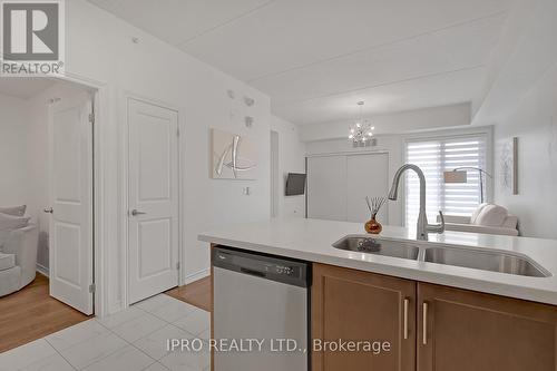 313 - 650 Sauve Street, Milton, ON - Indoor Photo Showing Kitchen With Double Sink