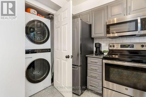 806 - 190 Manitoba Street, Toronto, ON - Indoor Photo Showing Laundry Room
