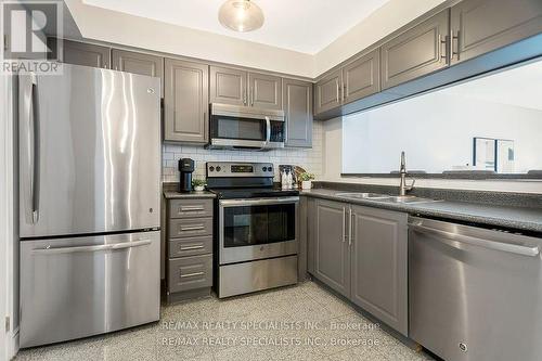 806 - 190 Manitoba Street, Toronto, ON - Indoor Photo Showing Kitchen With Stainless Steel Kitchen With Double Sink