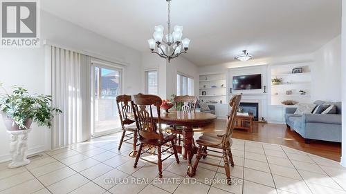 107 Pondmede Crescent, Whitchurch-Stouffville, ON - Indoor Photo Showing Dining Room With Fireplace