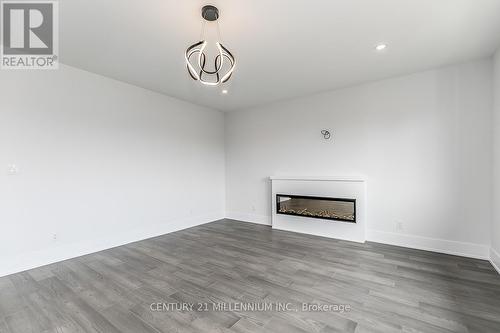 18 Lakeshore Road, Wasaga Beach, ON - Indoor Photo Showing Other Room With Fireplace