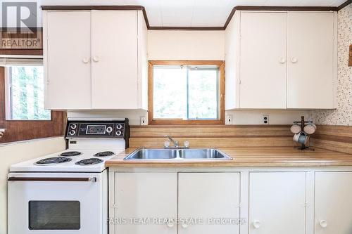 18 Park Road, Tiny, ON - Indoor Photo Showing Kitchen With Double Sink