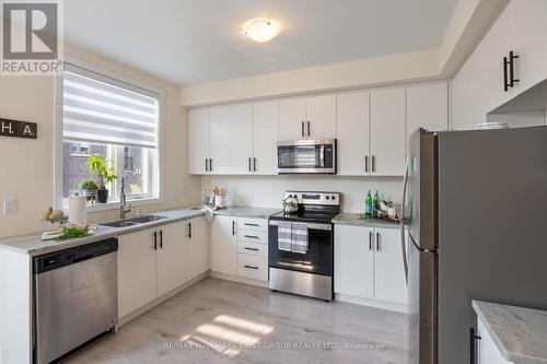 808 - 250 Finch Avenue, Pickering, ON - Indoor Photo Showing Kitchen With Stainless Steel Kitchen With Double Sink