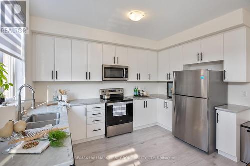 808 - 250 Finch Avenue, Pickering, ON - Indoor Photo Showing Kitchen With Stainless Steel Kitchen With Double Sink