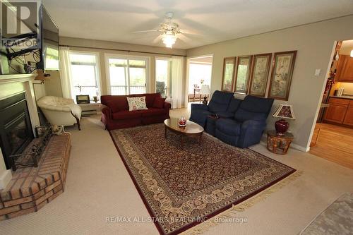 70 Balaclava Street, Kawartha Lakes, ON - Indoor Photo Showing Living Room With Fireplace