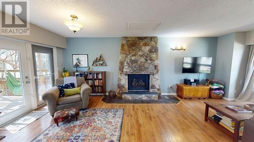10611 106 Avenue, Fort St. John, BC - Indoor Photo Showing Living Room With Fireplace