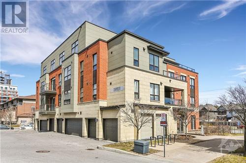 Garage space parking! - 301 Bayrose Drive Unit#302, Ottawa, ON - Outdoor With Facade