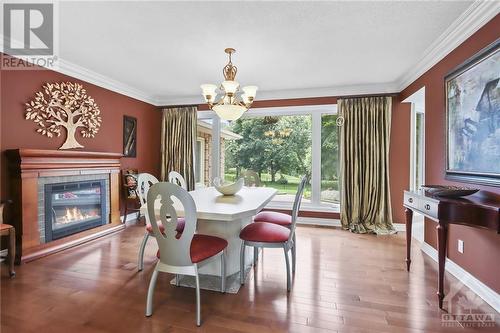 105 Locharron Crescent, Ottawa, ON - Indoor Photo Showing Dining Room With Fireplace