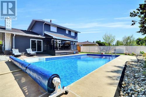 54 Mayfield Road, Regina, SK - Outdoor With In Ground Pool With Deck Patio Veranda With Backyard