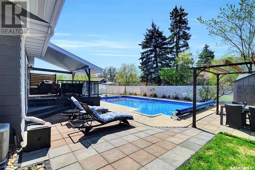 54 Mayfield Road, Regina, SK - Outdoor With In Ground Pool