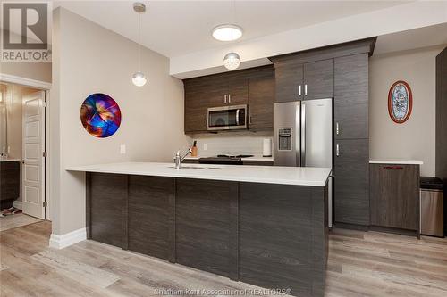 5840 Newman Unit# 105, Lasalle, ON - Indoor Photo Showing Kitchen With Upgraded Kitchen
