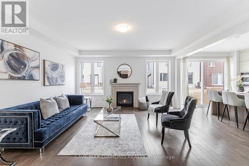 71 Milt Schmidt Street, Kitchener, ON - Indoor Photo Showing Living Room With Fireplace