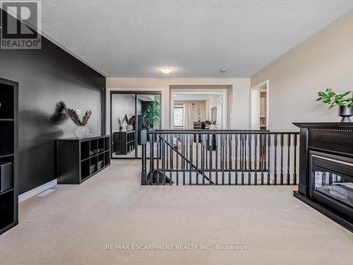 888 Toletza Landing, Milton, ON - Indoor Photo Showing Other Room With Fireplace