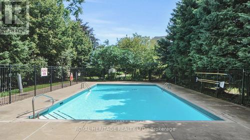 107 - 1730 Eglinton Avenue E, Toronto, ON - Outdoor With In Ground Pool With Backyard