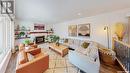 10 Marquis Crescent, Regina, SK  - Indoor Photo Showing Living Room With Fireplace 