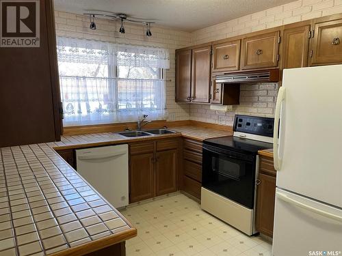 133 2Nd Street W, Lafleche, SK - Indoor Photo Showing Kitchen With Double Sink