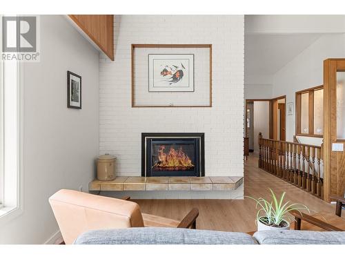 1245 Mountain Avenue, Kelowna, BC - Indoor Photo Showing Living Room With Fireplace