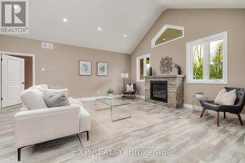 117 Pugh Street, Perth East, ON - Indoor Photo Showing Living Room With Fireplace