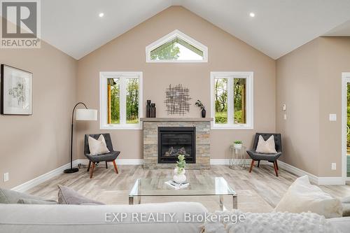 117 Pugh Street, Perth East, ON - Indoor Photo Showing Living Room With Fireplace