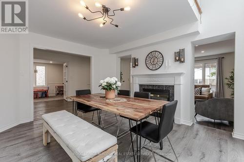 12 Strathroy Crescent, Hamilton, ON - Indoor Photo Showing Dining Room With Fireplace