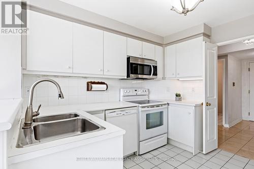 910 - 1800 The Collegeway, Mississauga, ON - Indoor Photo Showing Kitchen With Double Sink