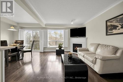 10 - 2151 Walkers Line, Burlington, ON - Indoor Photo Showing Living Room With Fireplace