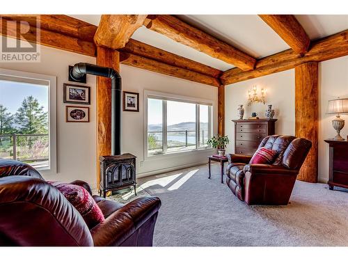 7410 Mclennan Road, Vernon, BC - Indoor Photo Showing Living Room With Fireplace