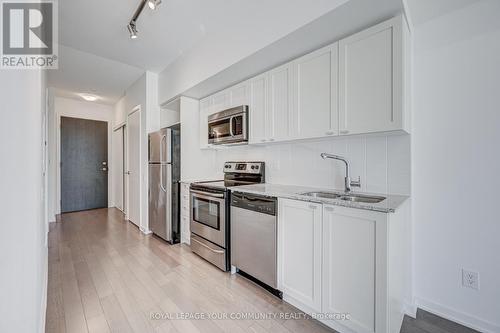 413 - 105 The Queensway Avenue, Toronto, ON - Indoor Photo Showing Kitchen With Double Sink