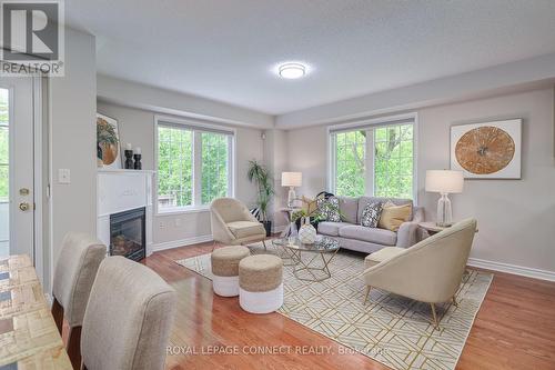 12 Ramona Way, Whitby, ON - Indoor Photo Showing Living Room With Fireplace
