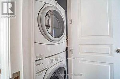 3903 - 183 Wellington Street W, Toronto, ON - Indoor Photo Showing Laundry Room