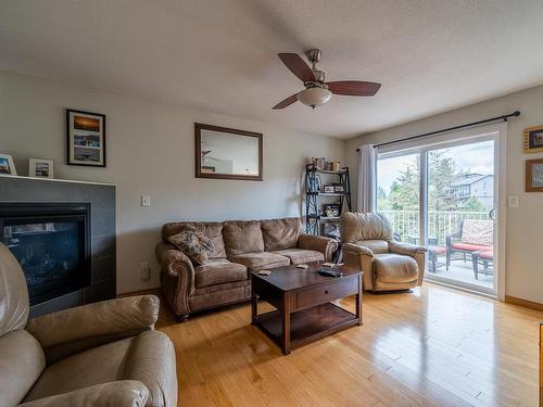4-1775 Mckinley Crt, Kamloops, BC - Indoor Photo Showing Living Room With Fireplace