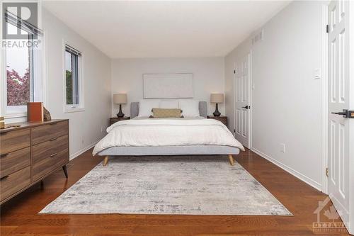 Primary bedroom includes a large walk-in closet. - 1454 Shawinigan Street, Ottawa, ON - Indoor Photo Showing Bedroom