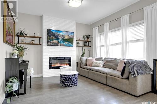 8020 Barley Crescent, Regina, SK - Indoor Photo Showing Living Room With Fireplace