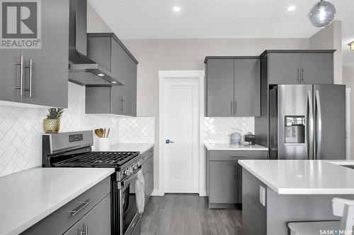8020 Barley Crescent, Regina, SK - Indoor Photo Showing Kitchen With Stainless Steel Kitchen With Upgraded Kitchen