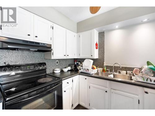 2428 12Th  Avenue, Castlegar, BC - Indoor Photo Showing Kitchen With Double Sink