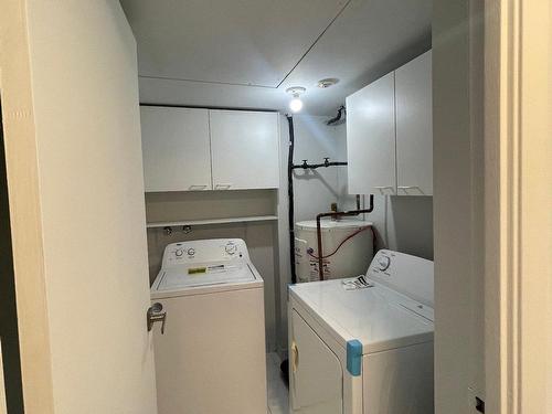 Salle de lavage - 201-2555 Rue Modugno, Montréal (Saint-Laurent), QC - Indoor Photo Showing Laundry Room