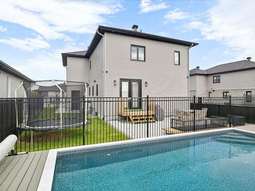 Backyard - 65 Rue Du Porc-Épic, Gatineau (Aylmer), QC - Outdoor With Above Ground Pool With Deck Patio Veranda With Exterior