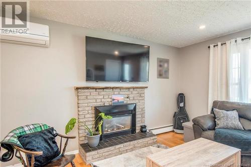 13 Nason Crescent, Oromocto, NB - Indoor Photo Showing Living Room With Fireplace