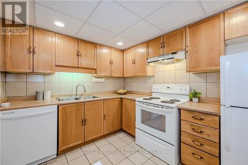 318 - 150 Wilson Street W, Hamilton (Ancaster), ON - Indoor Photo Showing Kitchen With Double Sink